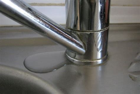 sink faucet leaking from base|Kitchen Faucet Leaking At Base: Causes & 5 Quick。